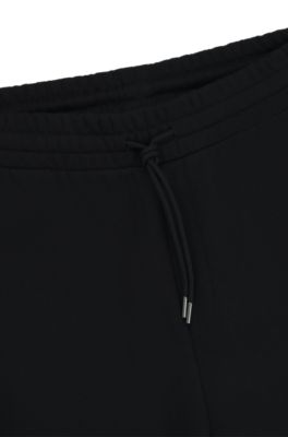 Pantalones de ch&aacute;ndal en felpa de algod&oacute;n con logo, Negro