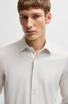 Camisa slim fit en punto t&eacute;cnico el&aacute;stico con microestructura, Beige claro