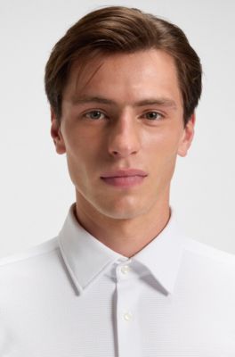 Camisa slim fit de punto el&aacute;stico t&eacute;cnico con textura, Blanco