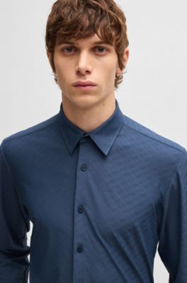 Camisa slim fit de el&aacute;stico t&eacute;cnico con jacquard de monogramas, Azul