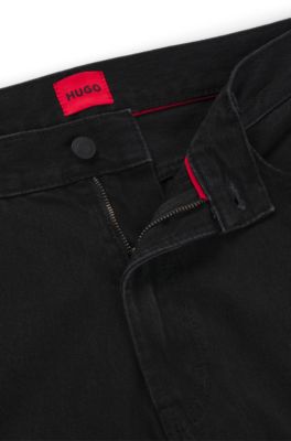 Relaxed tapered-fit jeans in black denim, Black