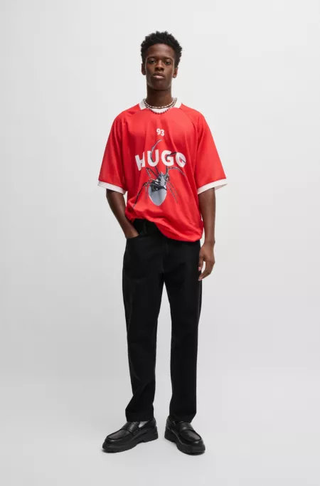 Relaxed tapered-fit jeans in black denim