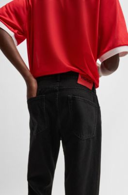 Relaxed tapered-fit jeans in black denim, Black