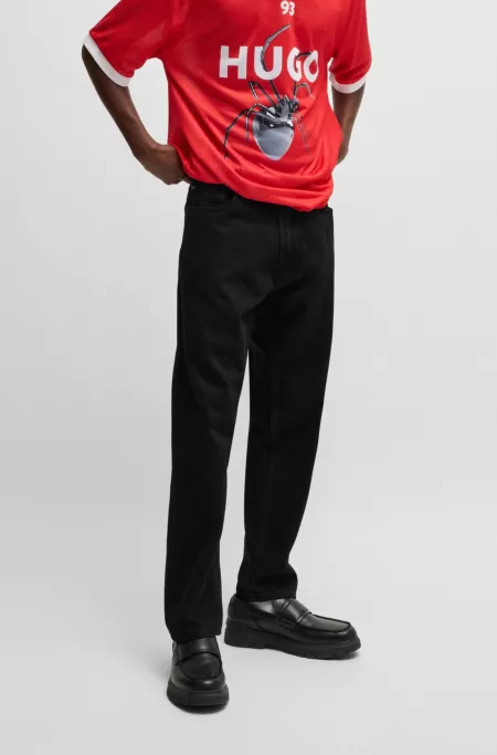 Relaxed tapered-fit jeans in black denim