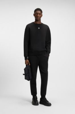 Stacked-logo tracksuit bottoms in a cotton blend, Black