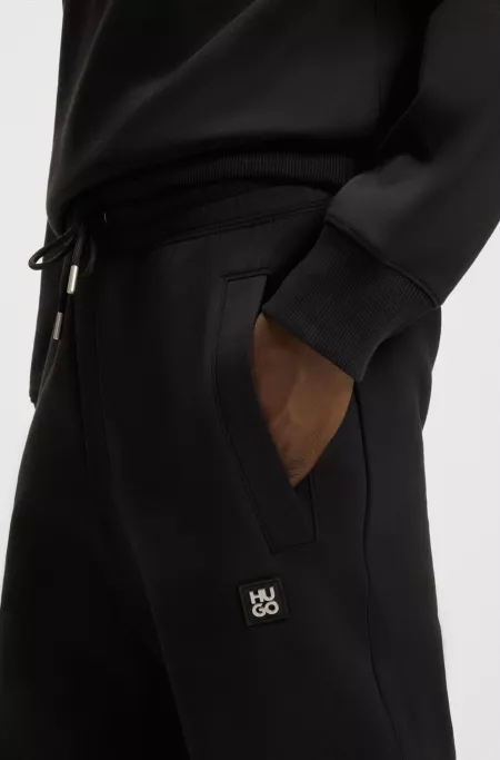 Stacked-logo tracksuit bottoms in a cotton blend