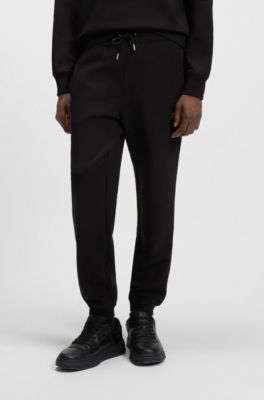 Stacked-logo tracksuit bottoms in a cotton blend, Black