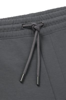Stacked-logo tracksuit bottoms in a cotton blend, Light Grey