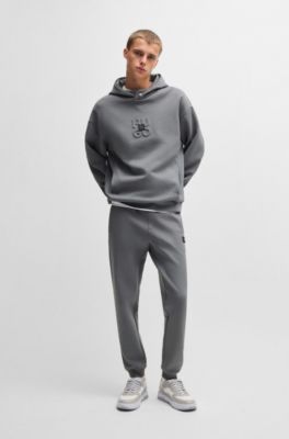 Stacked-logo tracksuit bottoms in a cotton blend, Light Grey