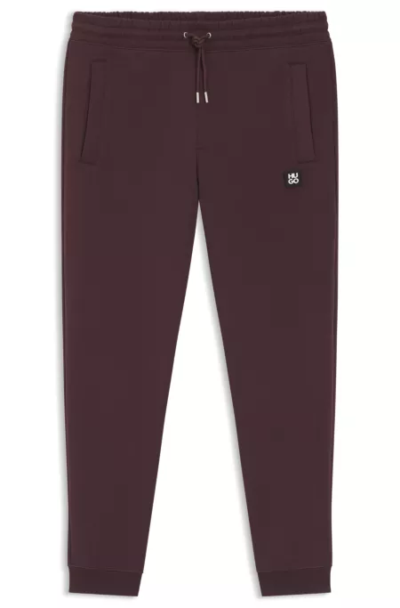 Stacked-logo tracksuit bottoms in a cotton blend