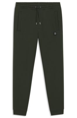 Stacked-logo tracksuit bottoms in a cotton blend, Dark Green