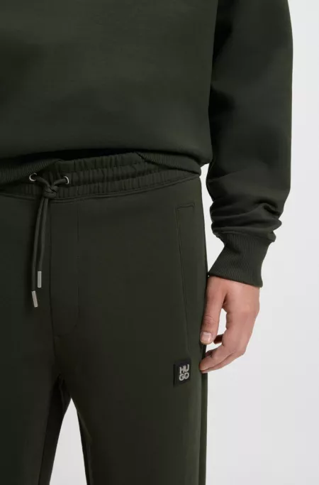 Stacked-logo tracksuit bottoms in a cotton blend