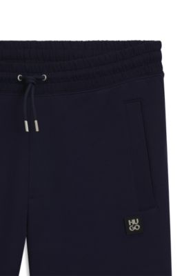 Bas de surv&ecirc;tement en coton m&eacute;lang&eacute; avec logo revisit&eacute;, Bleu fonc&eacute;