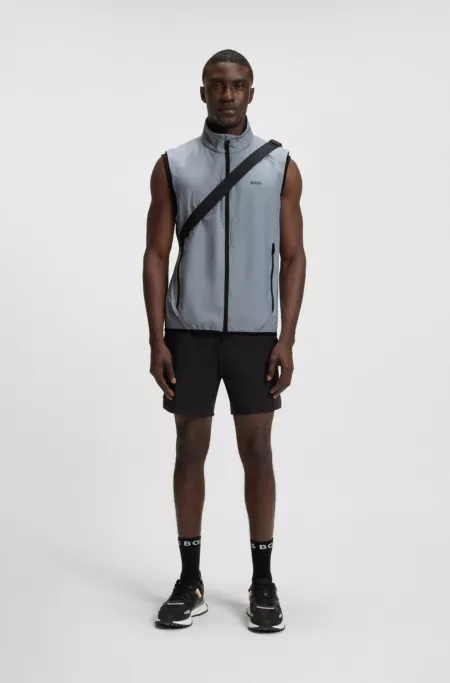 Water-repellent golf vest with decorative reflective details