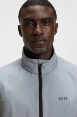 Water-repellent golf vest with decorative reflective details, Dark Grey