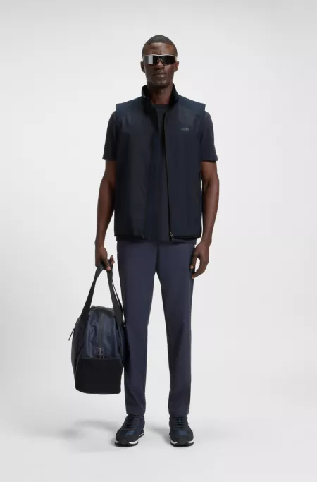 Water-repellent golf vest with decorative reflective details