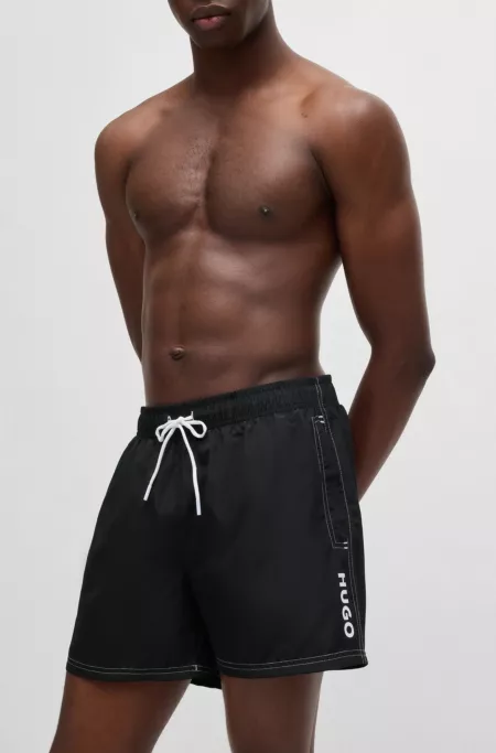 Fully lined swim shorts with logo print