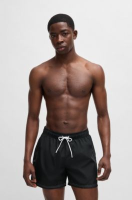 Ba&ntilde;ador tipo shorts con forro integral y logo estampado, Negro