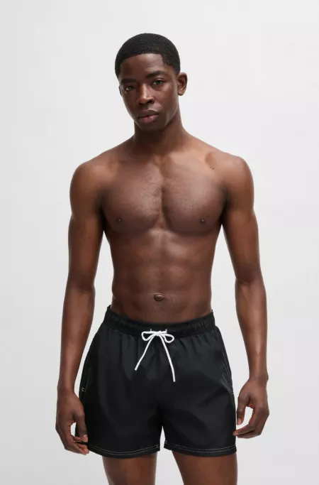 Fully lined swim shorts with logo print