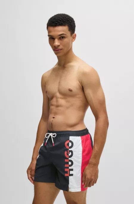 Color-blocked swim shorts with two-tone logo