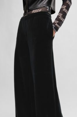 Bas de surv&ecirc;tement Relaxed en velours stretch, Noir