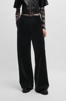 Relaxed-fit tracksuit bottoms in stretch velour, Black