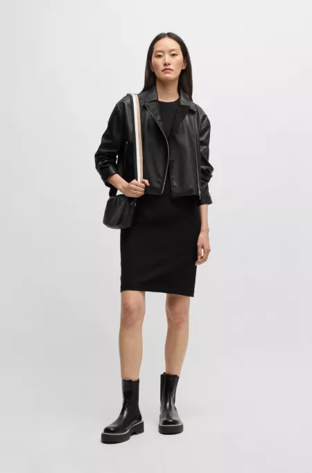 Faux-leather biker-style jacket with signature trims