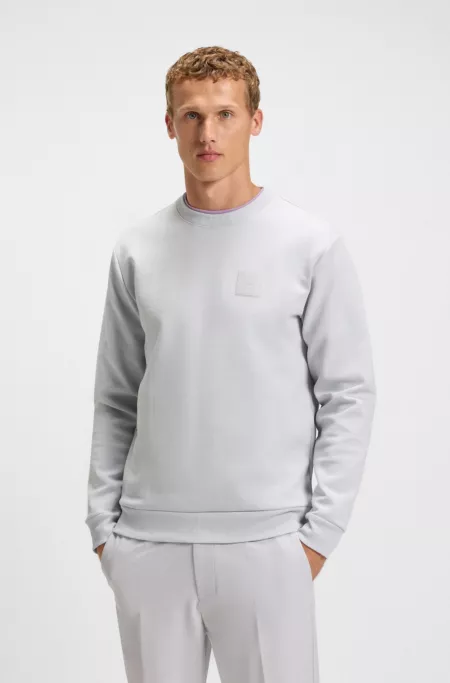Sweatshirt with drop-needle stitching
