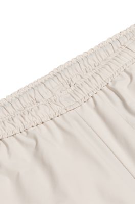 Shorts de tenis activos en tejido superel&aacute;stico de secado r&aacute;pido, Beige claro