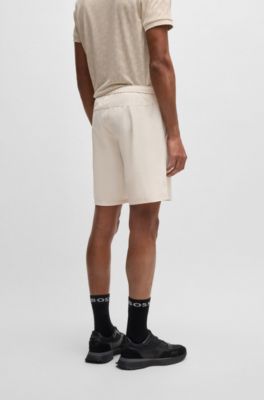 Shorts de tenis activos en tejido superel&aacute;stico de secado r&aacute;pido, Beige claro