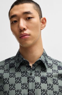 Camisa slim fit en popel&iacute;n de algod&oacute;n con estampado de temporada, Cal