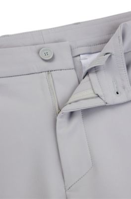Pantalones slim fit de tejido el&aacute;stico repelente al agua, Gris claro