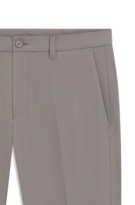 Pantalones slim fit de tejido el&aacute;stico hidr&oacute;fugo, Gris claro