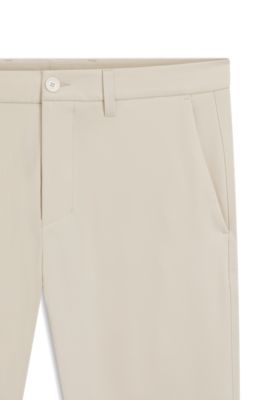 Pantalones slim fit de tejido el&aacute;stico hidr&oacute;fugo, Blanco