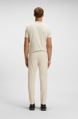 Pantalones slim fit de tejido el&aacute;stico hidr&oacute;fugo, Blanco