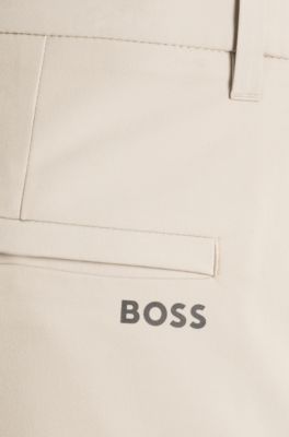 Pantalones slim fit de tejido el&aacute;stico hidr&oacute;fugo, Beige claro