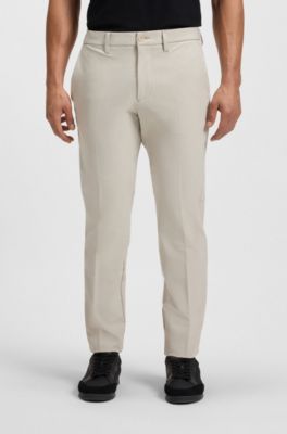 Pantalones slim fit de tejido el&aacute;stico hidr&oacute;fugo, Beige claro