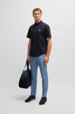 Pantalones slim fit de tejido el&aacute;stico repelente al agua, Celeste