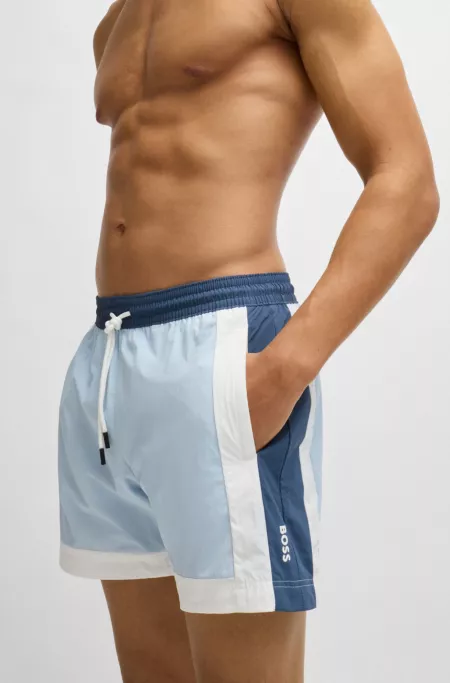 Quick-dry swim shorts with color-blocking