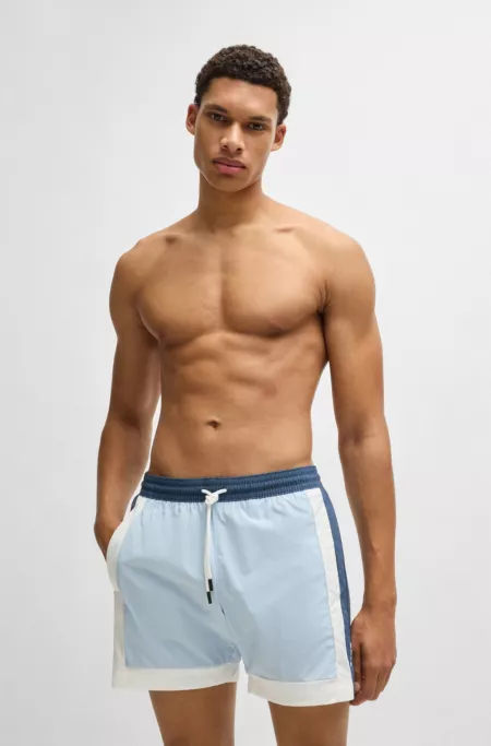 Quick-dry swim shorts with color-blocking