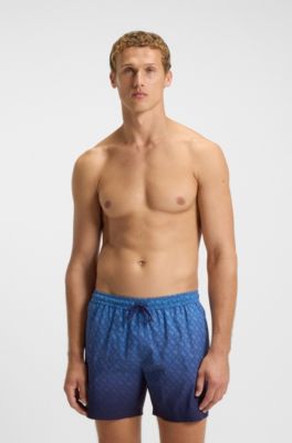 Logo-badge swim shorts with degrad&eacute; monogram print, Blue