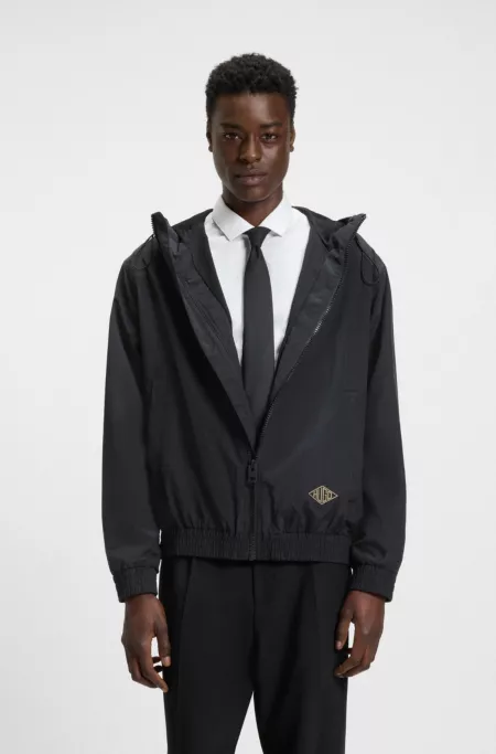 Hooded windbreaker jacket with mesh lining