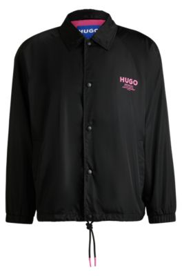 Veste d&rsquo;entra&icirc;neur Regular d&eacute;perlante &agrave; logos imprim&eacute;s, Noir