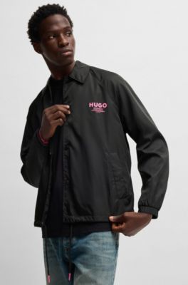 Veste d&rsquo;entra&icirc;neur Regular d&eacute;perlante &agrave; logos imprim&eacute;s, Noir
