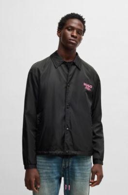 Veste d&rsquo;entra&icirc;neur Regular d&eacute;perlante &agrave; logos imprim&eacute;s, Noir