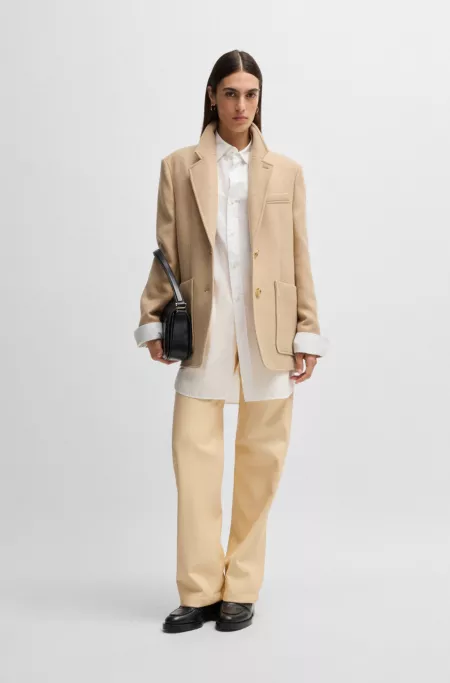 Five-pocket trousers in faux leather