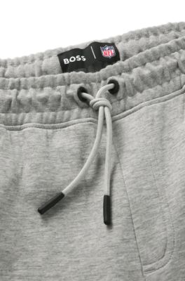 Pantalones de ch&aacute;ndal BOSS x NFL con cinta y detalles especiales de la marca, Raiders