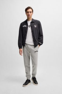 Pantalones de ch&aacute;ndal BOSS x NFL con cinta y detalles especiales de la marca, Raiders
