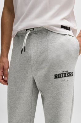 Pantalones de ch&aacute;ndal BOSS x NFL con cinta y detalles especiales de la marca, Raiders