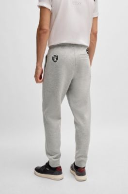 Pantalones de ch&aacute;ndal BOSS x NFL con cinta y detalles especiales de la marca, Raiders